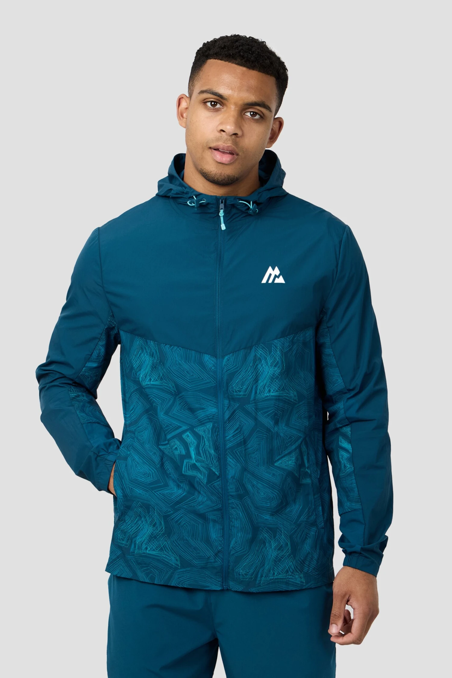 Geo M Print Windbreaker - Abyssal Geo M Print Windbreaker - Abyssal -MONTIREX CLOHTING SALE GEO M PRINT WINDBREAKER SAILOR BLUE CLOSE FRONT scaled