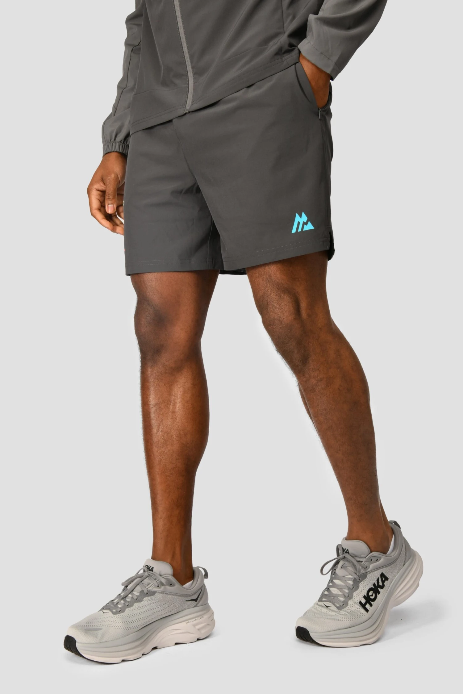 MTX Run Vital Short - Cement Grey/Jet Grey MTX Run Vital Short - Cement Grey/Jet Grey -MONTIREX CLOHTING SALE MTX RUN VITAL SHORT JET GREY side logo scaled