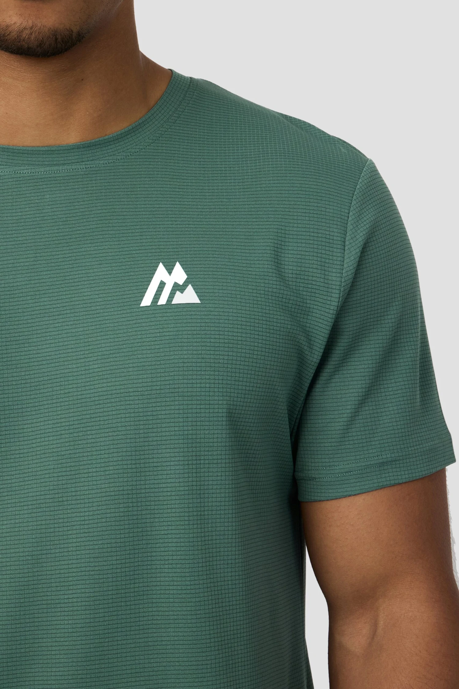 Peak Gridded Polartec® T-Shirt - Dolphin Peak Gridded Polartec® T-Shirt - Dolphin -MONTIREX CLOHTING SALE PEAK GRIDDED T SHIRT SILVER PINE LOGO scaled