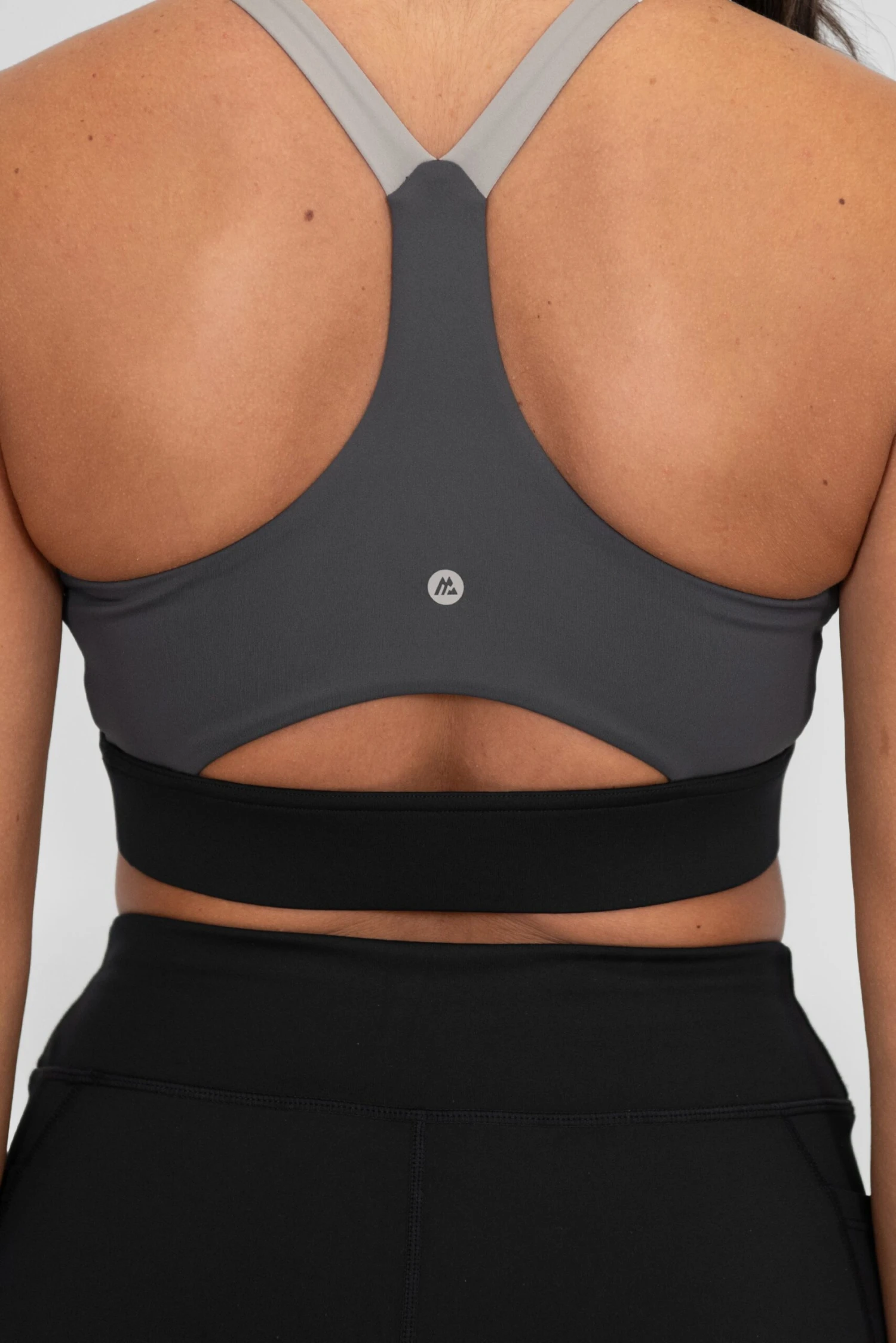 Stride Sports Bra - Black/Basalt/Asphalt Stride Sports Bra - Black/Basalt/Asphalt -MONTIREX CLOHTING SALE STRIDE BRA BLACK BEAUTY ULTIMATE GRAY ASPHALT Back Detail scaled