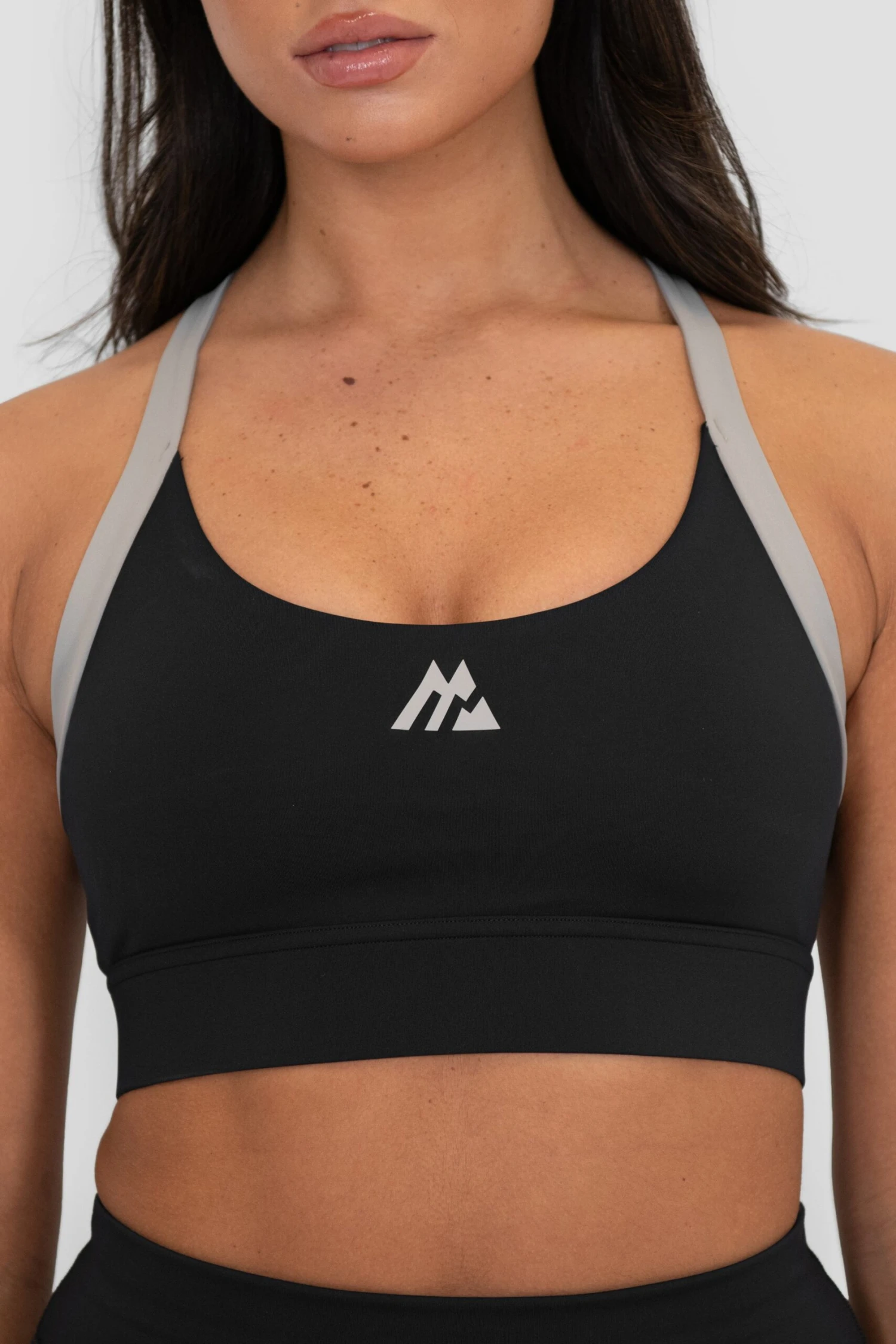 Stride Sports Bra - Black/Basalt/Asphalt Stride Sports Bra - Black/Basalt/Asphalt -MONTIREX CLOHTING SALE STRIDE BRA BLACK BEAUTY ULTIMATE GRAY ASPHALT Logo scaled