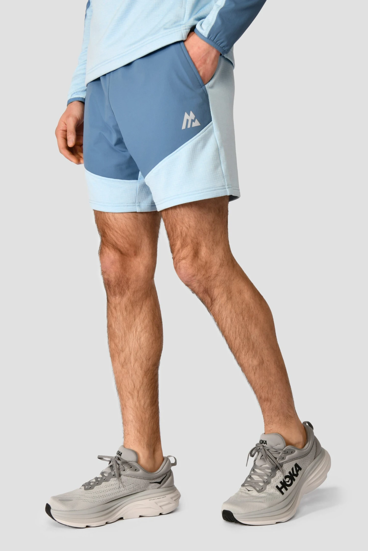 Summit Poly Short - Moonstone Marl/Steel Blue Summit Poly Short - Moonstone Marl/Steel Blue -MONTIREX CLOHTING SALE SUMMIT POLY SHORT MOONSTONE MARL STEEL BLUE close side Logo scaled