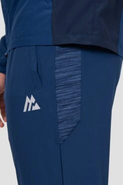 Trail Panel Running Pant - Navy Multi 9 Trail Panel Running Pant - Navy Multi -MONTIREX CLOHTING SALE TRAIL 2.0 PANT ESTATE BLUE SET SAIL TRUE NAVY logo detail